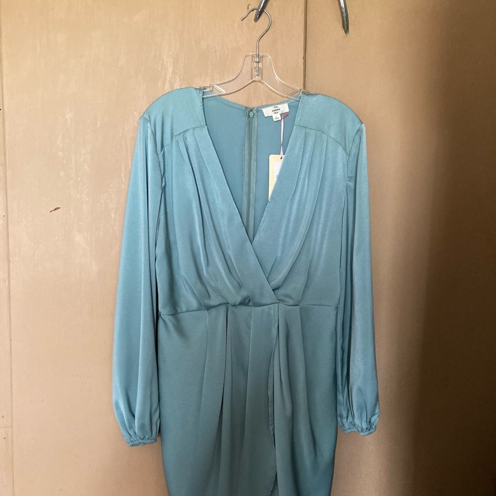 Size Large fits like a medium.  Never been worn.  Was bought at a boutique.
